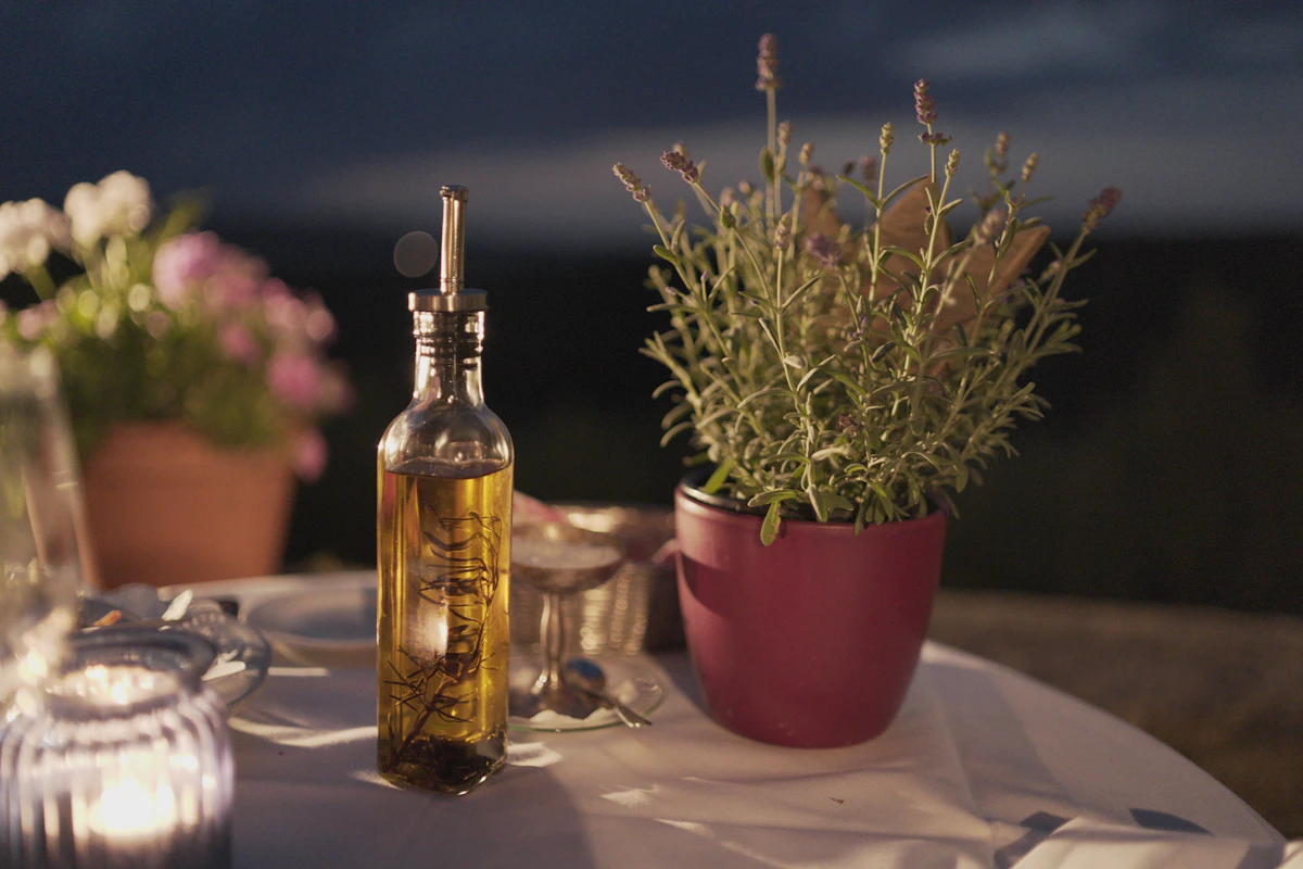 cold pressed olive oil in a glass bottle on a table